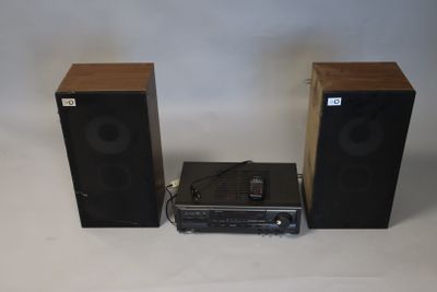 two speakers that are sitting next to each other