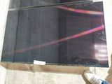a person standing in front of a television screen