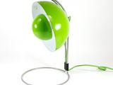lime green table lamp with a white base and a green cord