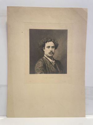 an old photo of a man in a suit and tie