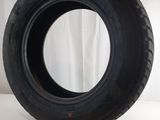an image of a tire that is sitting on a white surface
