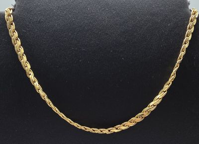 a gold chain necklace on a mannequin mannequin mannequin mannequin mannequin mannequin mannequin mannequin manne