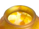 a yellow vase with a yellow flower design on it