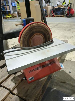 a machine that is sitting on a pallet in a warehouse