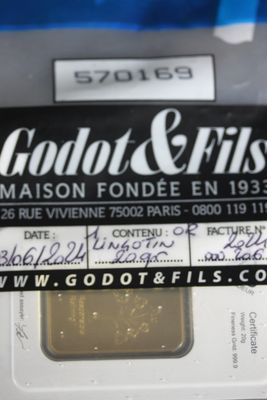 a close up of a gold bar in a package