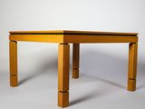 a small wooden table with two legs on a white background