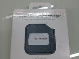 a white box with an electronic charger inside of it