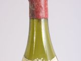 a bottle of wine that is sitting on a table