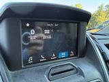 a picture of a car dashboard with a digital display