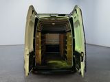an image of a green van with its doors open