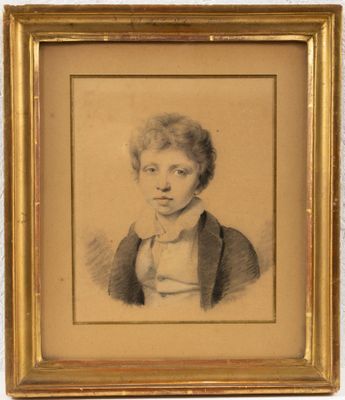 portrait d'un homme en costume et nœud papillon dans un cadre doré
