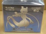 packaging of a pokemon figure in a clear box on a table