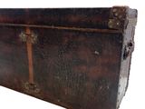 a brown trunk with a handle on a white background
