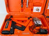an orange tool case with tools in it sitting on a white surface