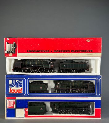two black and red model trains sitting on top of each other
