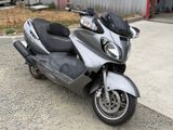 a motorcycle that is parked on the side of the road