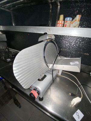 a machine that is sitting on a counter in a kitchen
