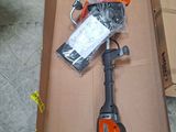 a box that has some tools in it on the floor