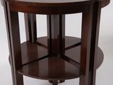 a wooden table with a glass top on a white background