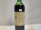 a bottle of wine that is sitting on a table
