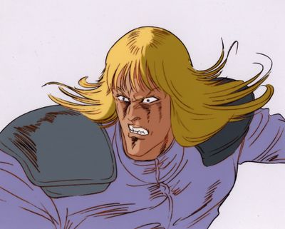 une image représentant un personnage de bande dessinée : un homme aux cheveux blonds portant une chemise bleue