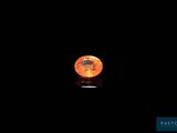 an orange moon shines in the dark sky with a black background