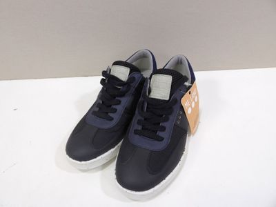 navy blue and orange sneakers with white soles on a white surface