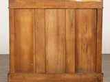 an old wooden chest sitting on top of a hard wood floor