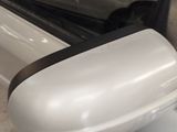 a close up of a side view mirror of a car