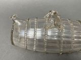 an image of a glass container with a horse on it