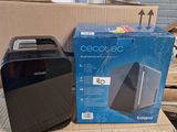 a box with a black and silver toaster and a box with a black and white toaster