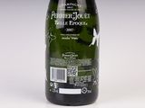 a bottle of wine that is sitting on a table