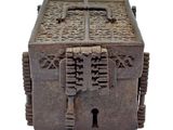 an old metal box with a lock on it