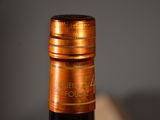 a close up of a bottle of wine on a table