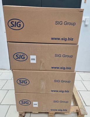 three boxes stacked on top of each other on a pallet