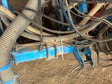 an image of a machine that is working on a piece of machinery