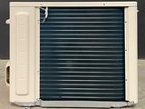 a closed air conditioner sitting outside of a building