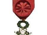 l'image d'une médaille surmontée d'une étoile