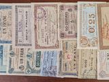 several different types of paper money laid out on a table