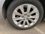 a close up of a tire on a car ' s rim