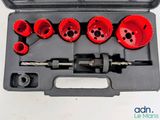 a set of red holesaws in a black case