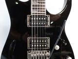 an image of a black electric guitar on a white background