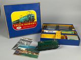 an image of a toy train set in a blue box