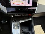 the interior of a car with a dash camera mounted on the dash