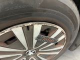 a close up of a tire with a sticker on it