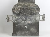 two birds sitting on top of a metal container