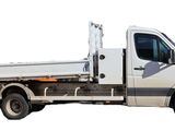 a white truck that is parked on the side of the road
