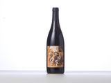 a bottle of wine sitting on top of a table