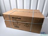 a box that is wrapped up and sitting on a table