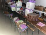many boxes on the tables in the room